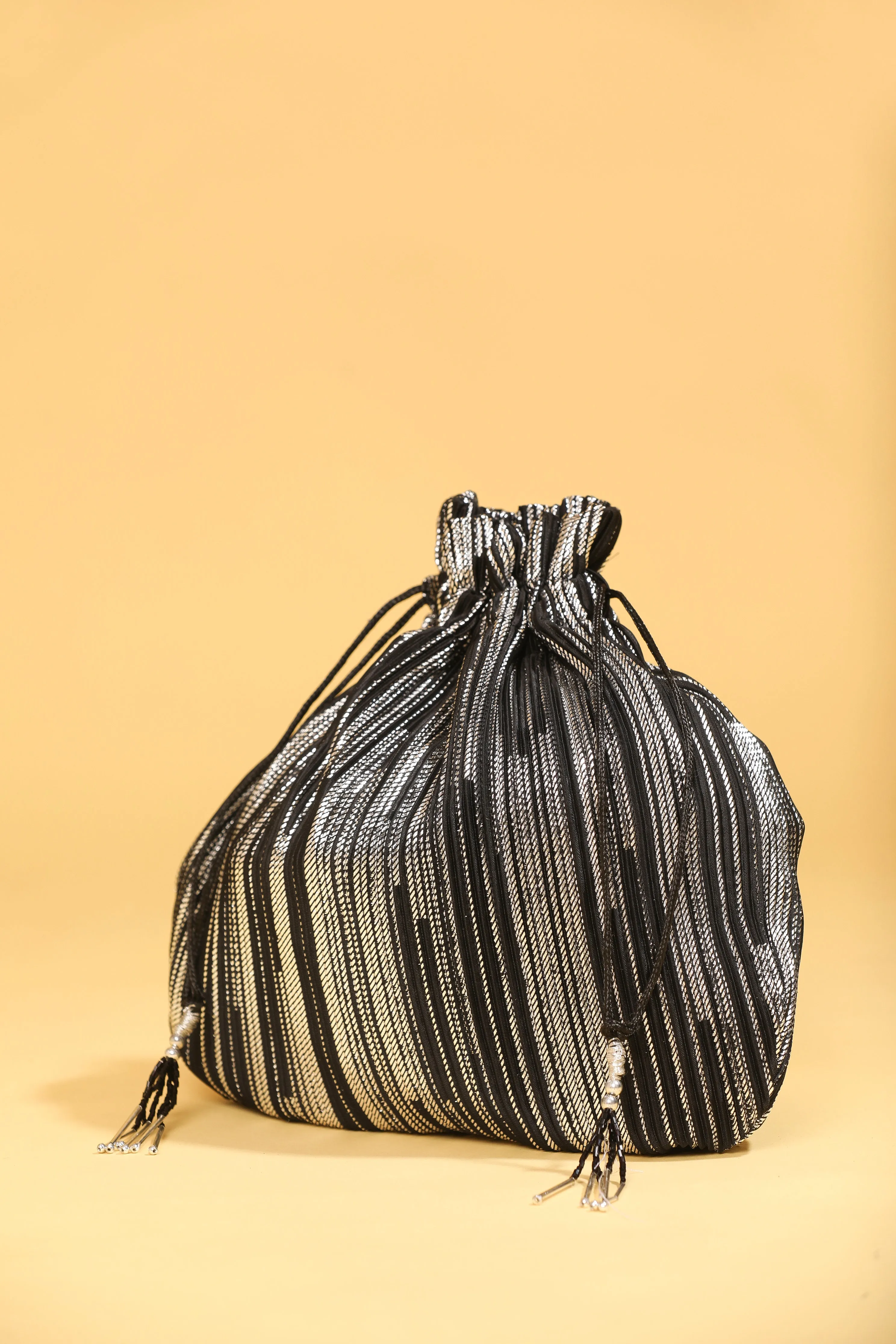 Black Bead Work Potli Bag with Sequin Detailing and Long Tassels